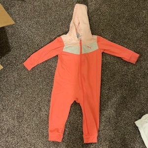 Puma zip up jump suit.